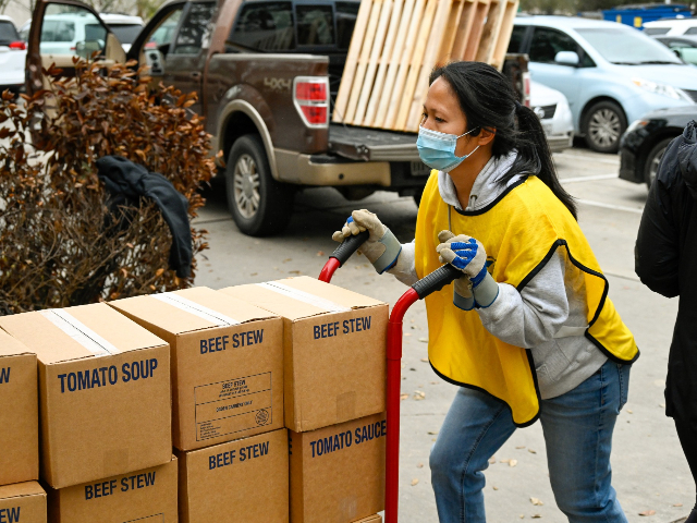 Helping Hands Volunteers Distribute Food in Houston